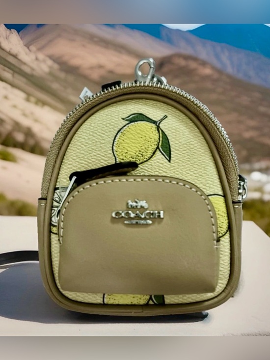 Coach Handbags - COACH Lemon Print Mini Court Backpack Bag Charm in Coated Canvas/Leather